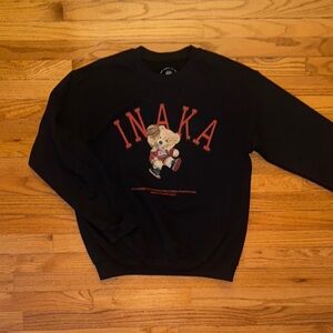 Inaka Power Black Crewneck Sweater with Red Accents